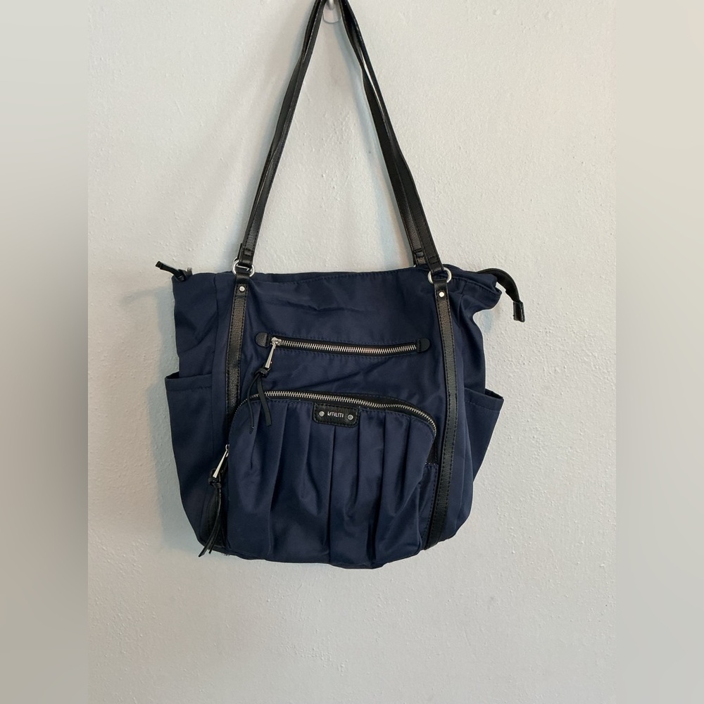 Utilities Woman’s Blue Weekender Bag.